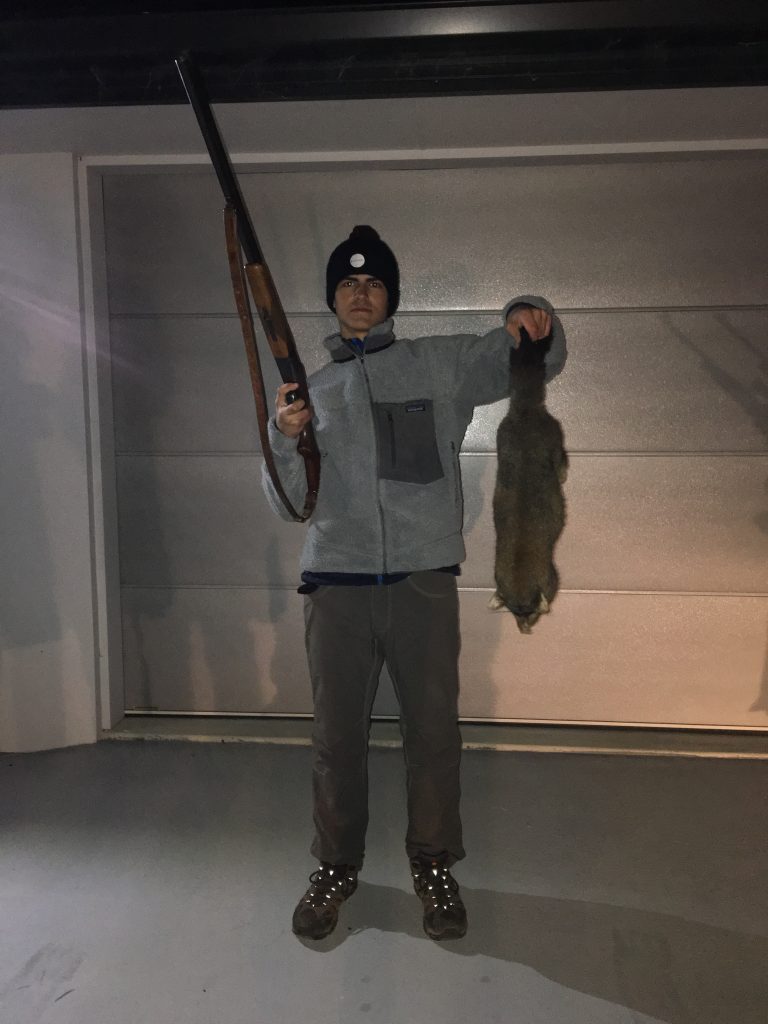 After an eventful hunt, pictured is Oliver Fisher holding the rifle he used to kill the possum.