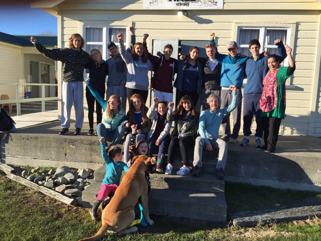Group photo in front of the Marae with our lovely hosts